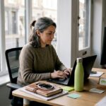 Business owner using laptop for email automation