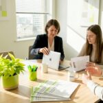 SME team discusses AI training at meeting table