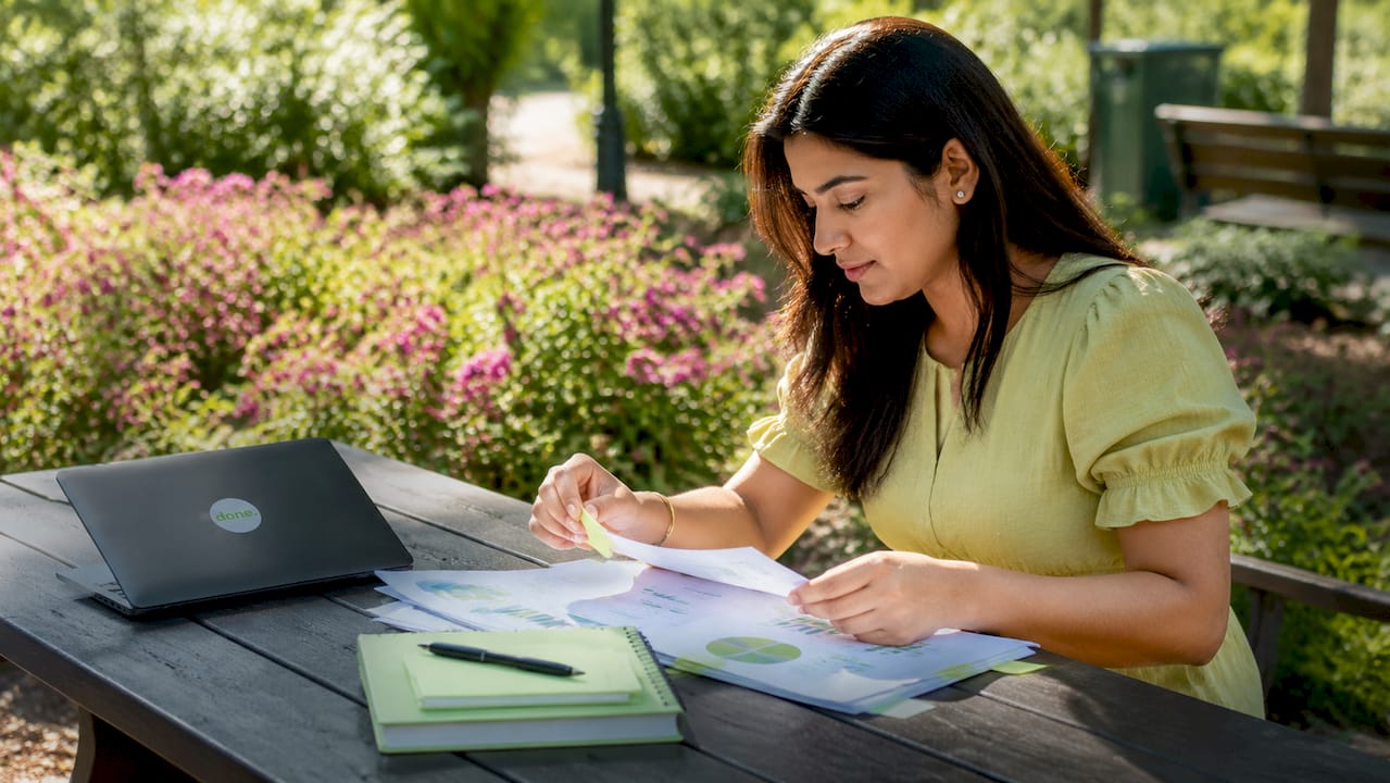 1781615827766_Woman-reviewing-inbound-marketing-plans Woman reviewing inbound marketing plans
