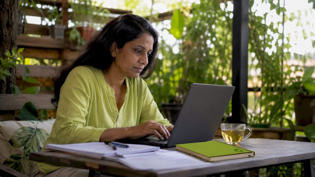 Woman working on local SEO laptop