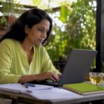 Woman working on local SEO laptop