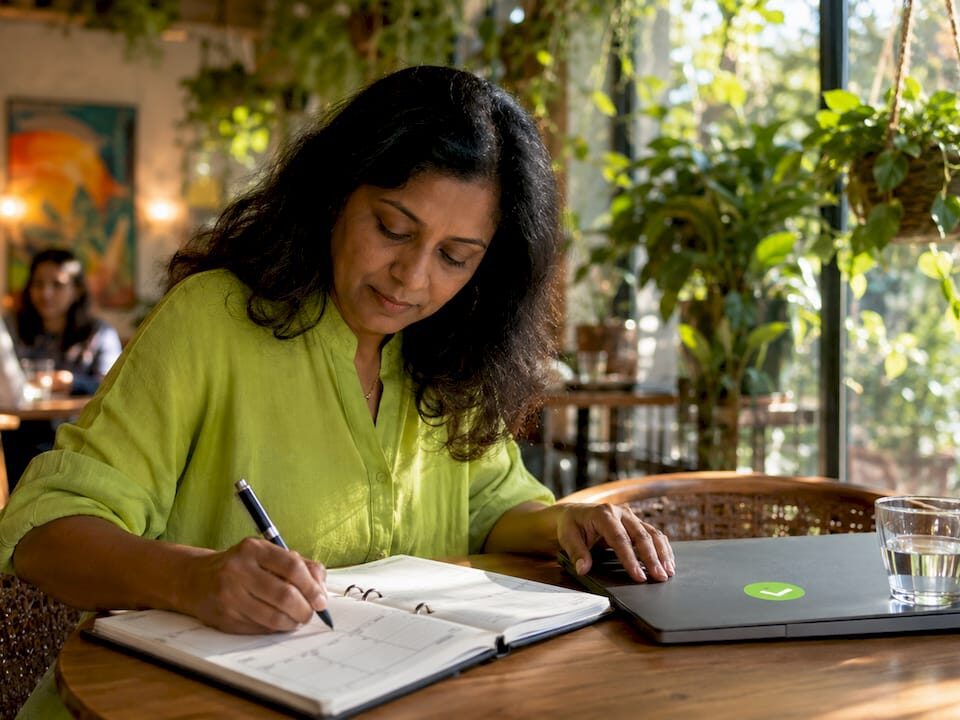 Woman planning ecommerce SEM strategy at desk