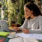 Woman conducting usability test on laptop