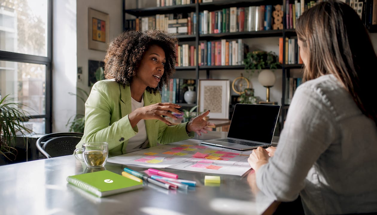 1785086582003_Woman-leading-customer-centric-design-discussion Woman leading customer-centric design discussion