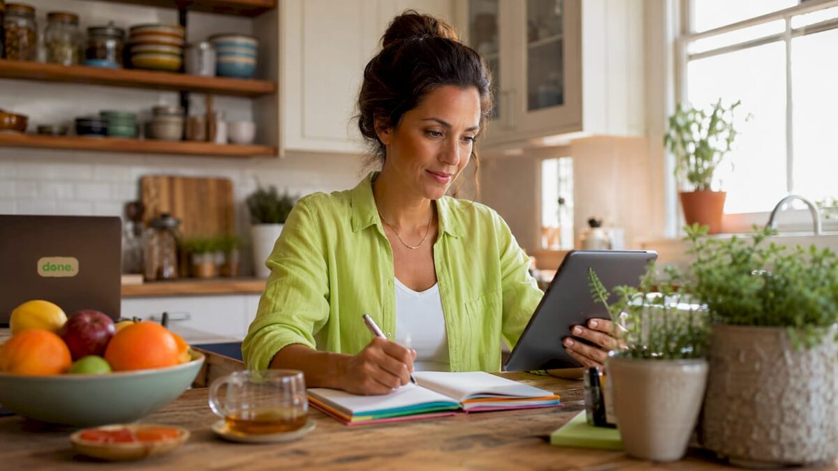 Business owner reviewing responsive website on tablet
