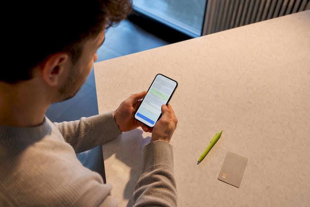 1789539232836_Hands-reviewing-an-ecommerce-checkout-flow Hands reviewing an ecommerce checkout flow